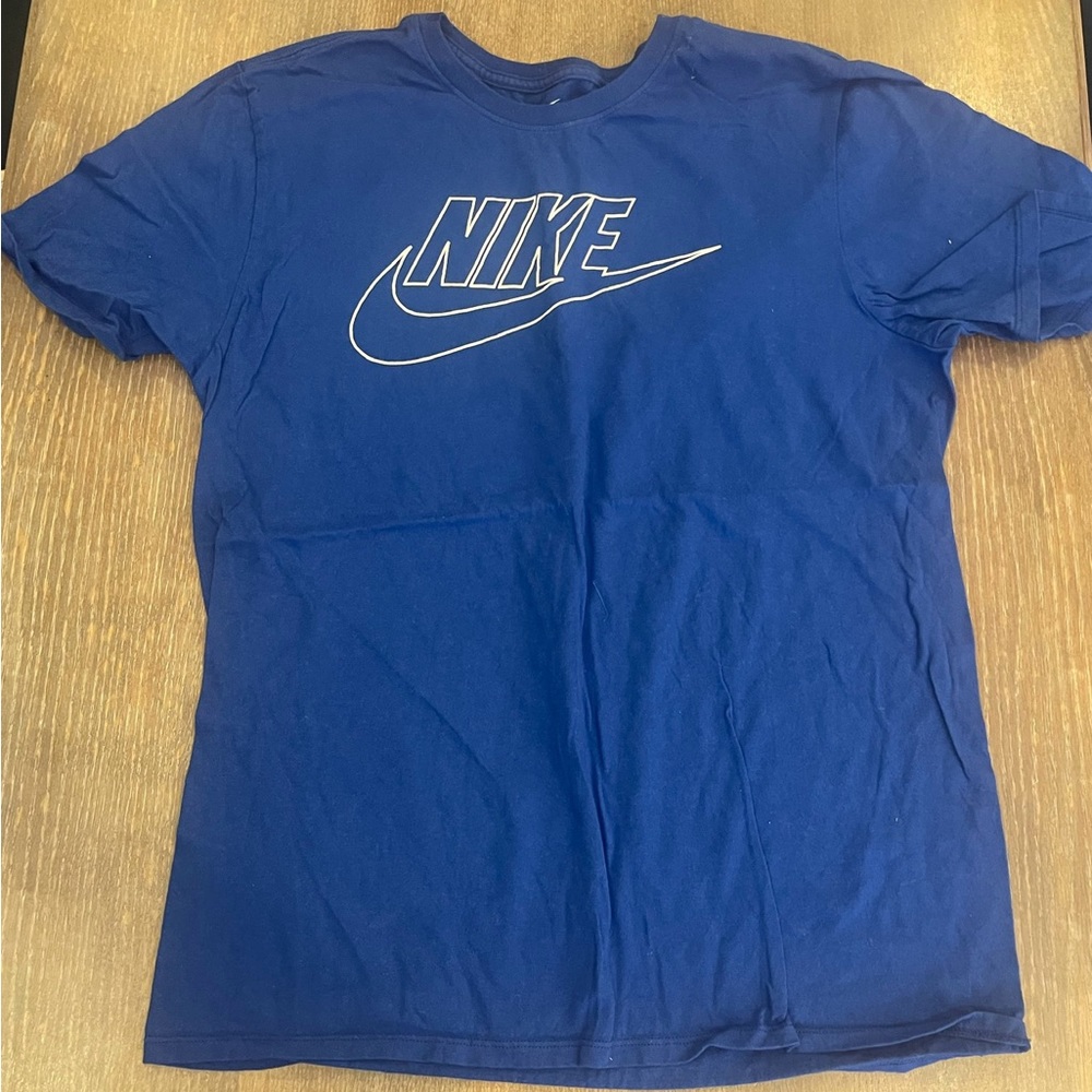 large blue nike shirt